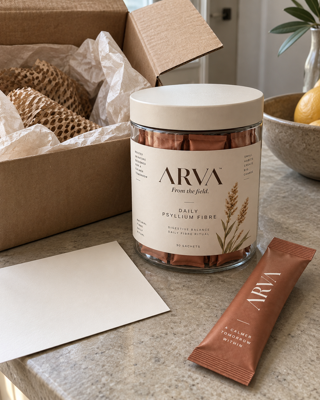 Arva jar and sachet on a kitchen counter beside the opened delivery box